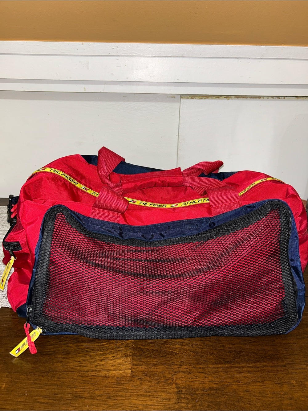 Red Athletic Duffle Bag with Navy and Yellow Accents Tommy Hilfiger